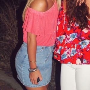 off the shoulder pink top.